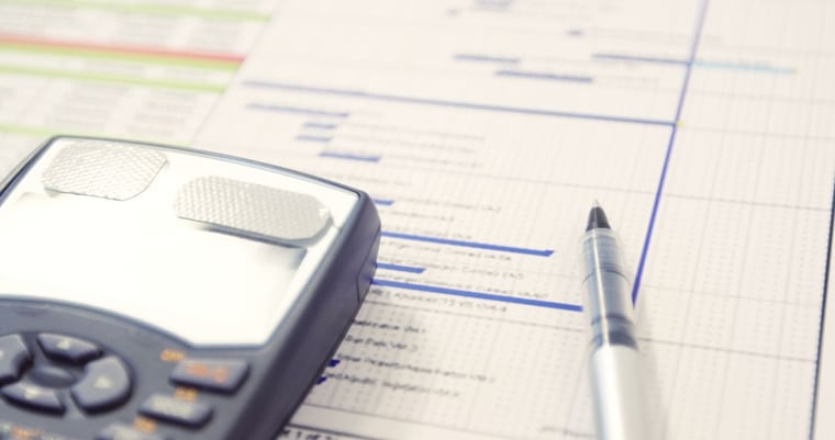 A project schedule and a calculator used to cost each project individually
